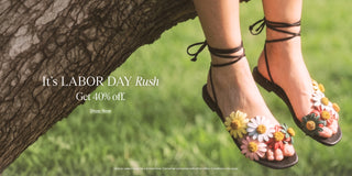 Labor Day sale banner featuring a model wearing black lace-up sandals adorned with colorful floral details, with text promoting 40% off select items.