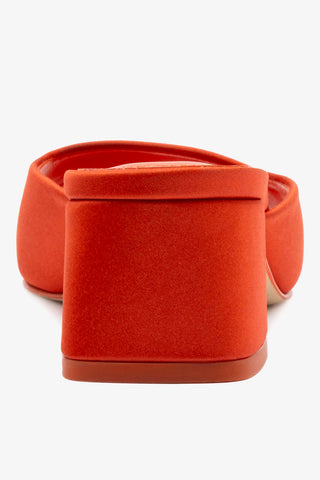 Chloe Gosselin by Larroudé Anah Mule In Orange Sunrise Satin