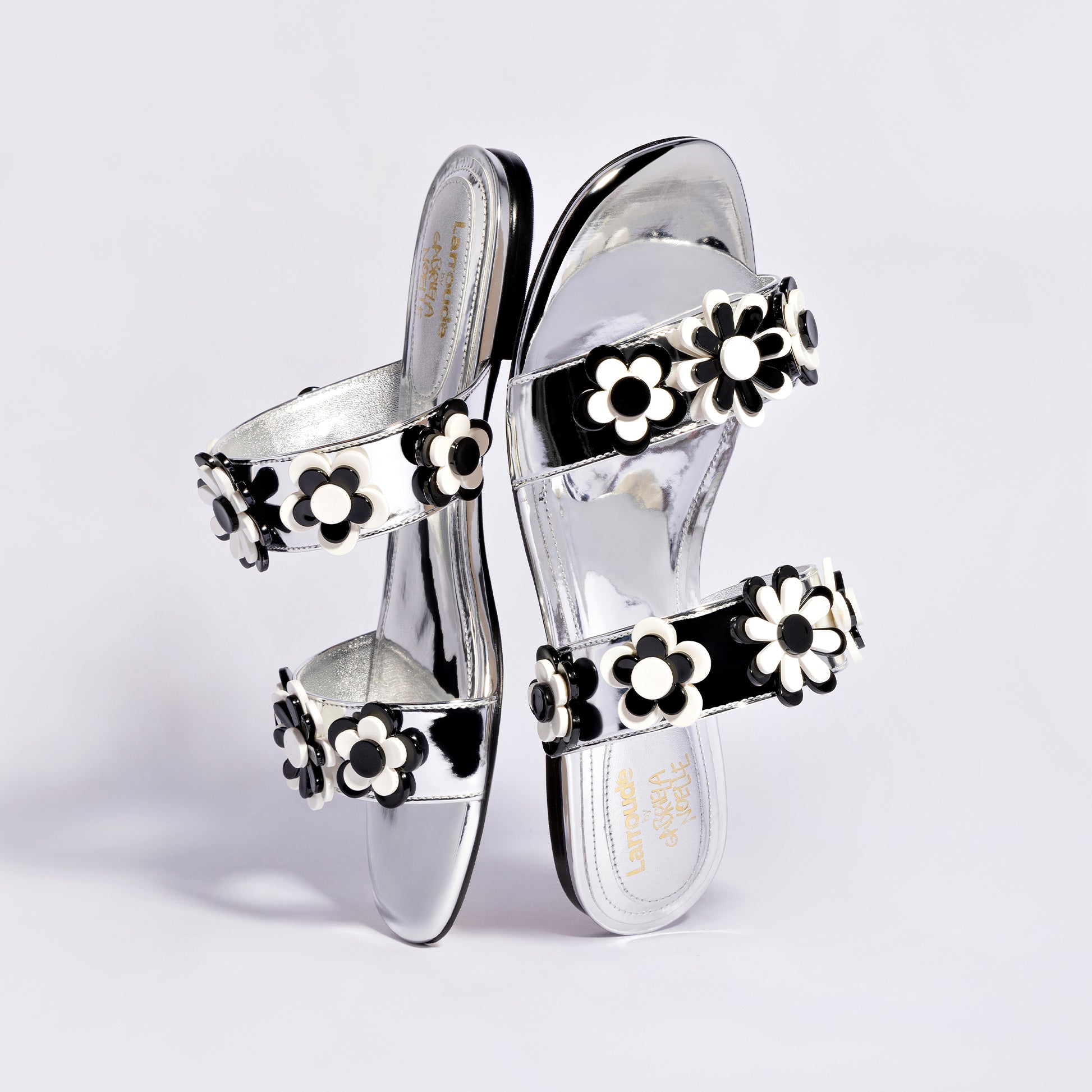 Larroudé x Gabriela Noelle: Blossom Flat Sandal In Silver Specchio and Black and White Acrylic