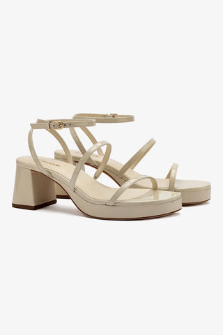 Gio Sandal In Ivory Patent Leather