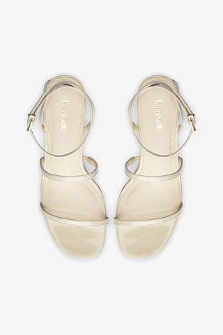 Gio Sandal In Ivory Patent Leather