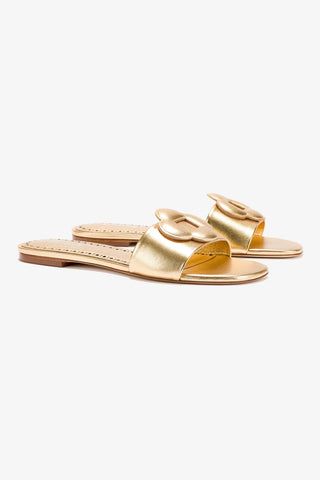 Flora Flat Mule In Gold Metallic Leather