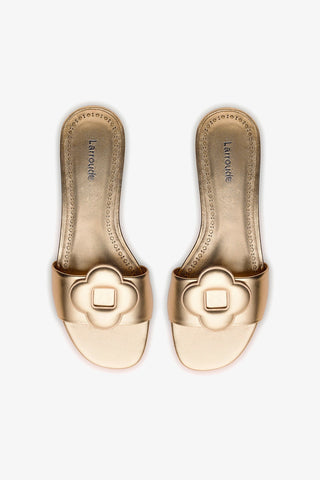 Flora Flat Mule In Gold Metallic Leather