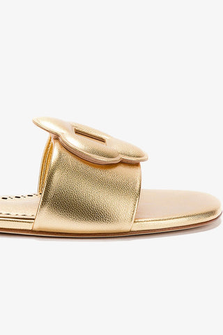 Flora Flat Mule In Gold Metallic Leather