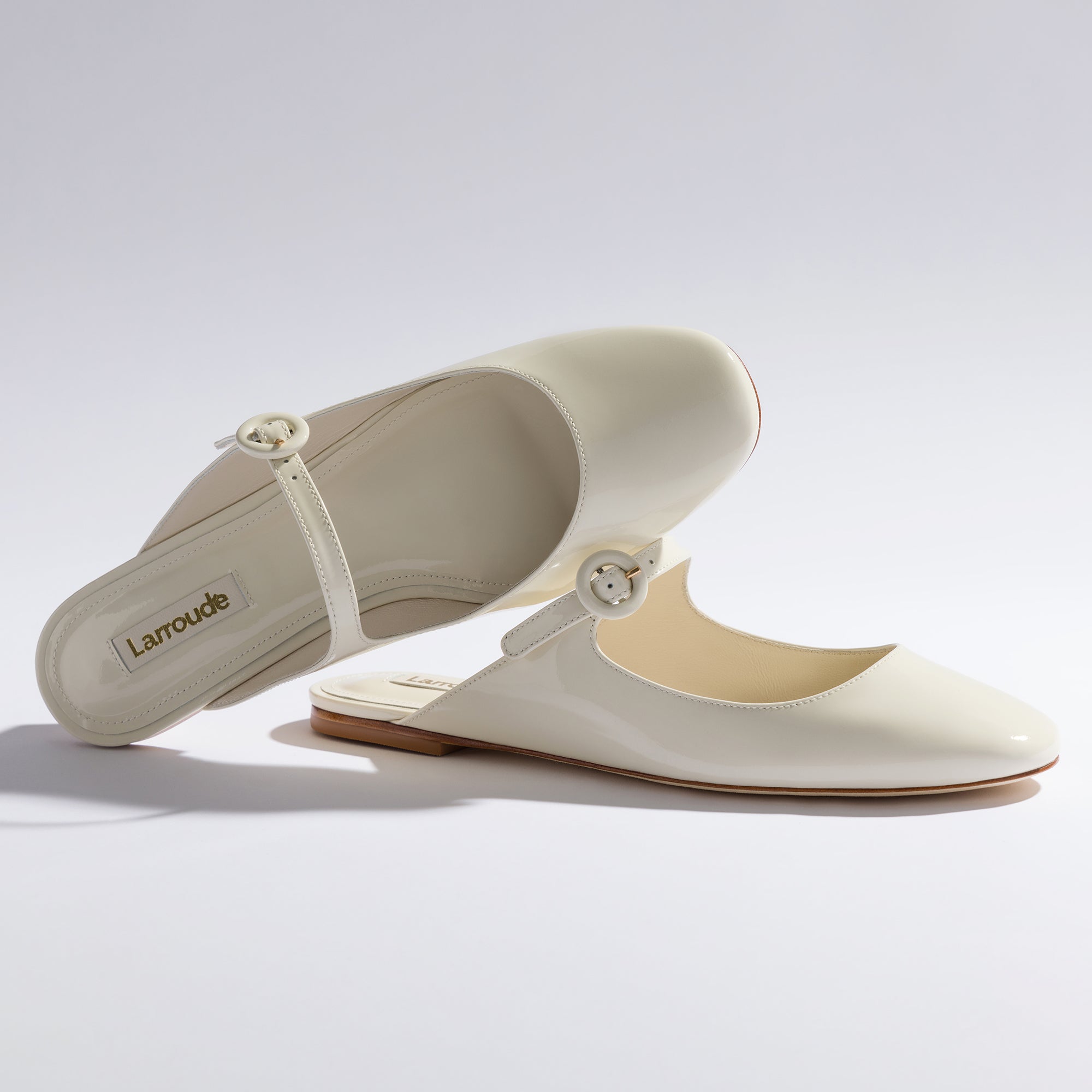 Blair Flat Mule In Ivory Patent Leather