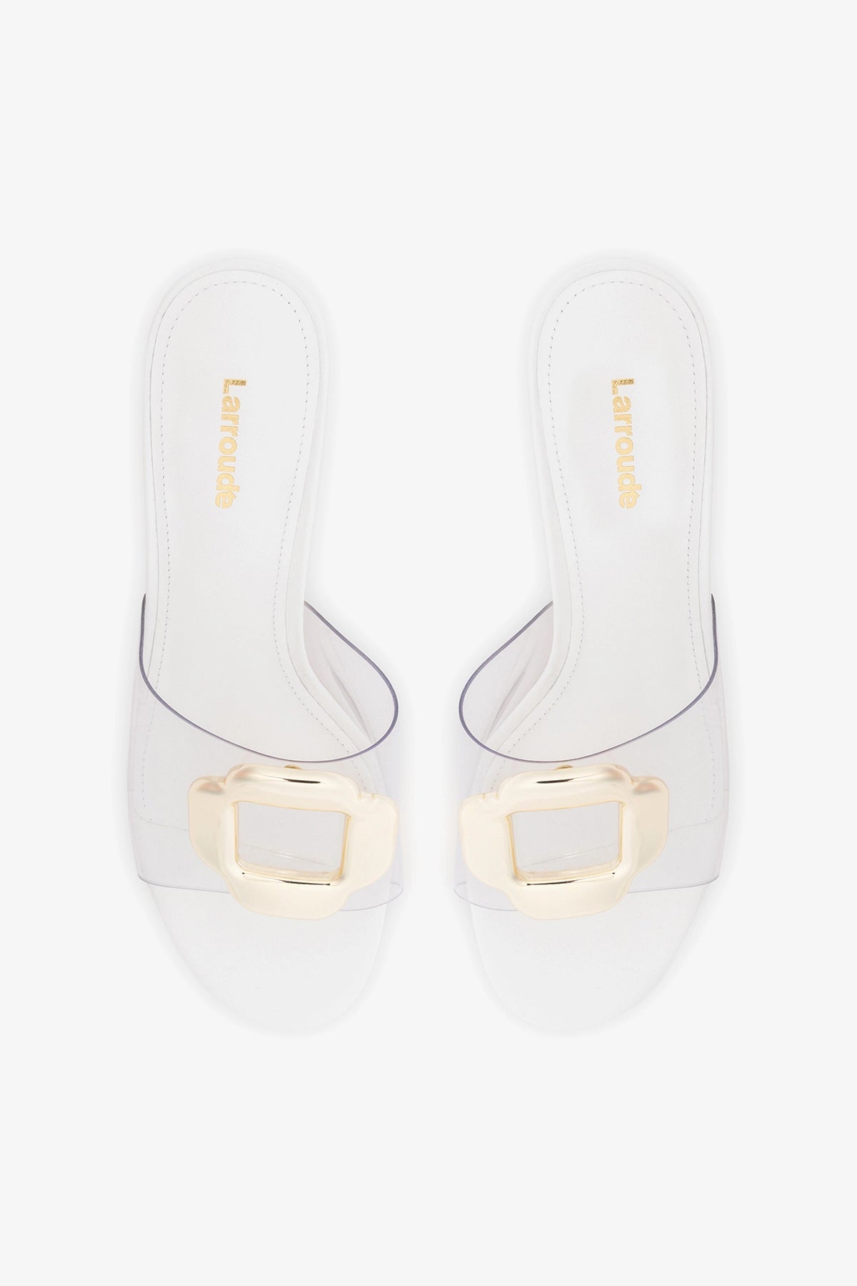 Transparent vinyl mule sandal with oversized gold-tone hardware Transparent vinyl mule sandal with oversized gold-tone hardware