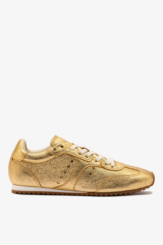 Stella Sneaker In Gold Metallic Leather