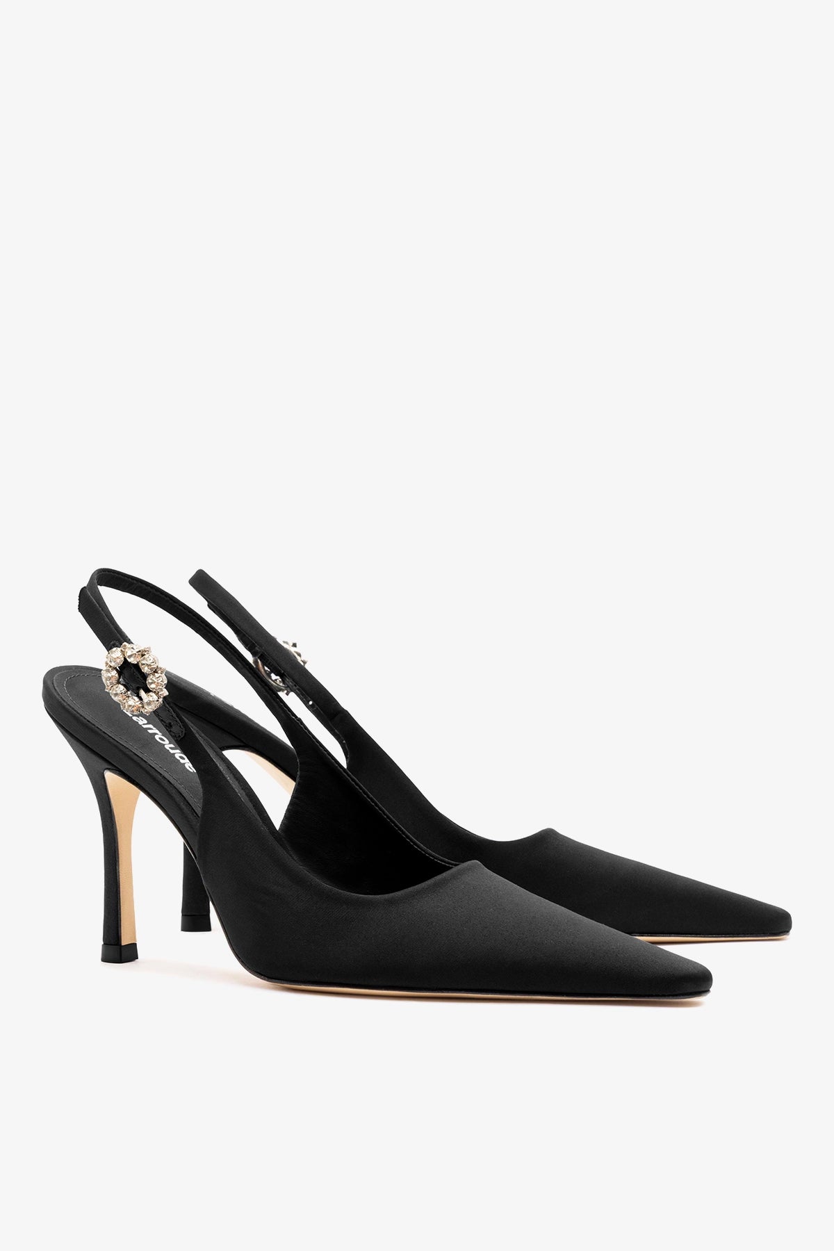 black slingback dress shoes Black satin slingback pump with pointed toe, stiletto heel and crystal buckle detail. 10 / Black